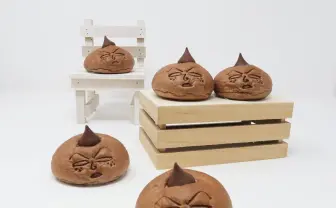 「永沢君、こんがり日焼けする」の巻　表情を再現したクリームパンが絶妙