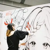 過去のイベントでライブドローイングを行うチェリ子さん