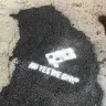 「Paving for Pizza」によって修復された道