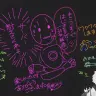 思い思いにライブの感想を壁に書いていく参加者たち