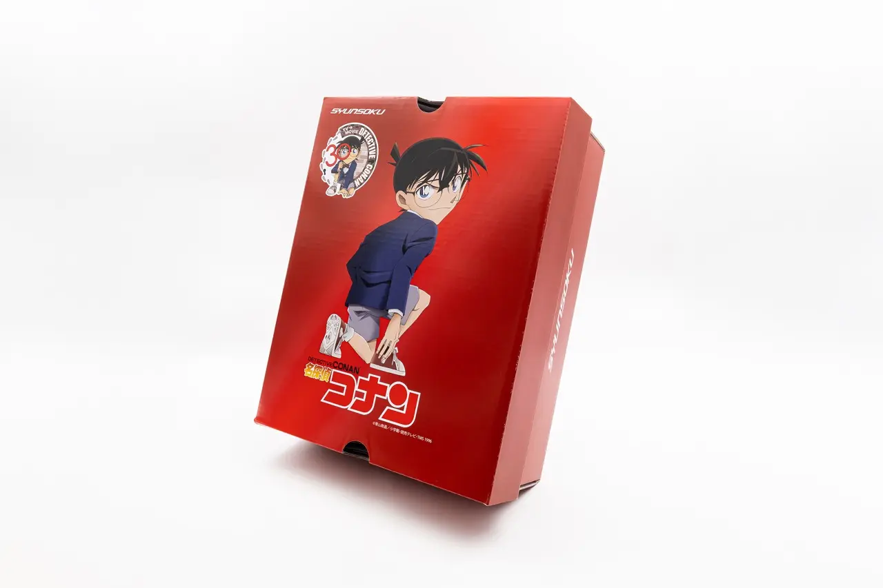 しゃがんでダイヤルに手をかけるコナンくんのイラストを使用したボックス