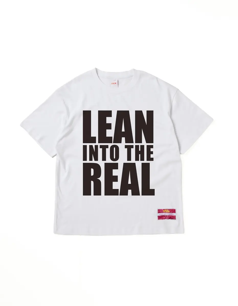 「“LEAN INTO THE REAL” TEE」（9900円）